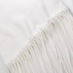 Celestia Sleeveless White Knit Midi Dress with Tassel Hem