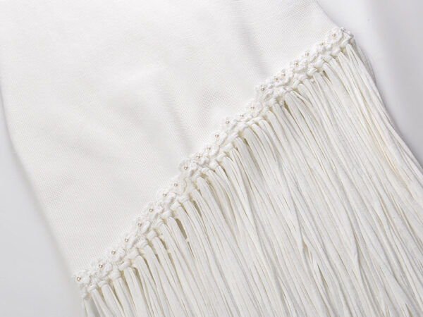 Celestia Sleeveless White Knit Midi Dress with Tassel Hem - Image 7