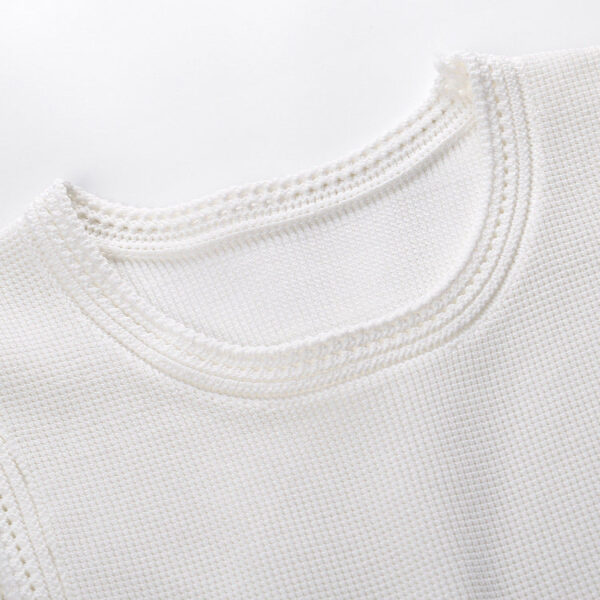 Celestia Sleeveless White Knit Midi Dress with Tassel Hem - Image 6