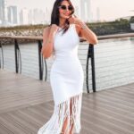 Celestia Sleeveless White Knit Midi Dress with Tassel Hem