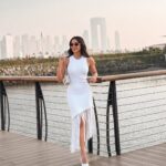 Celestia Sleeveless White Knit Midi Dress with Tassel Hem